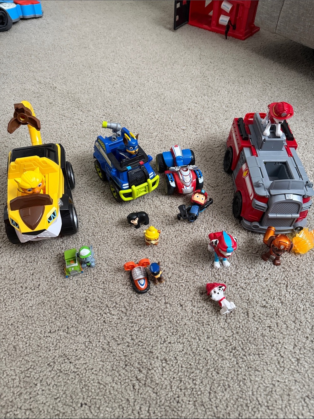 Paw Patrol Vehicle & Figure Set - Blue, Red, Yellow comes with they’re cars